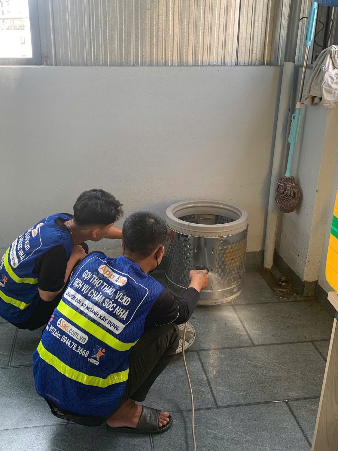 vệ sinh máy giặt bình dương